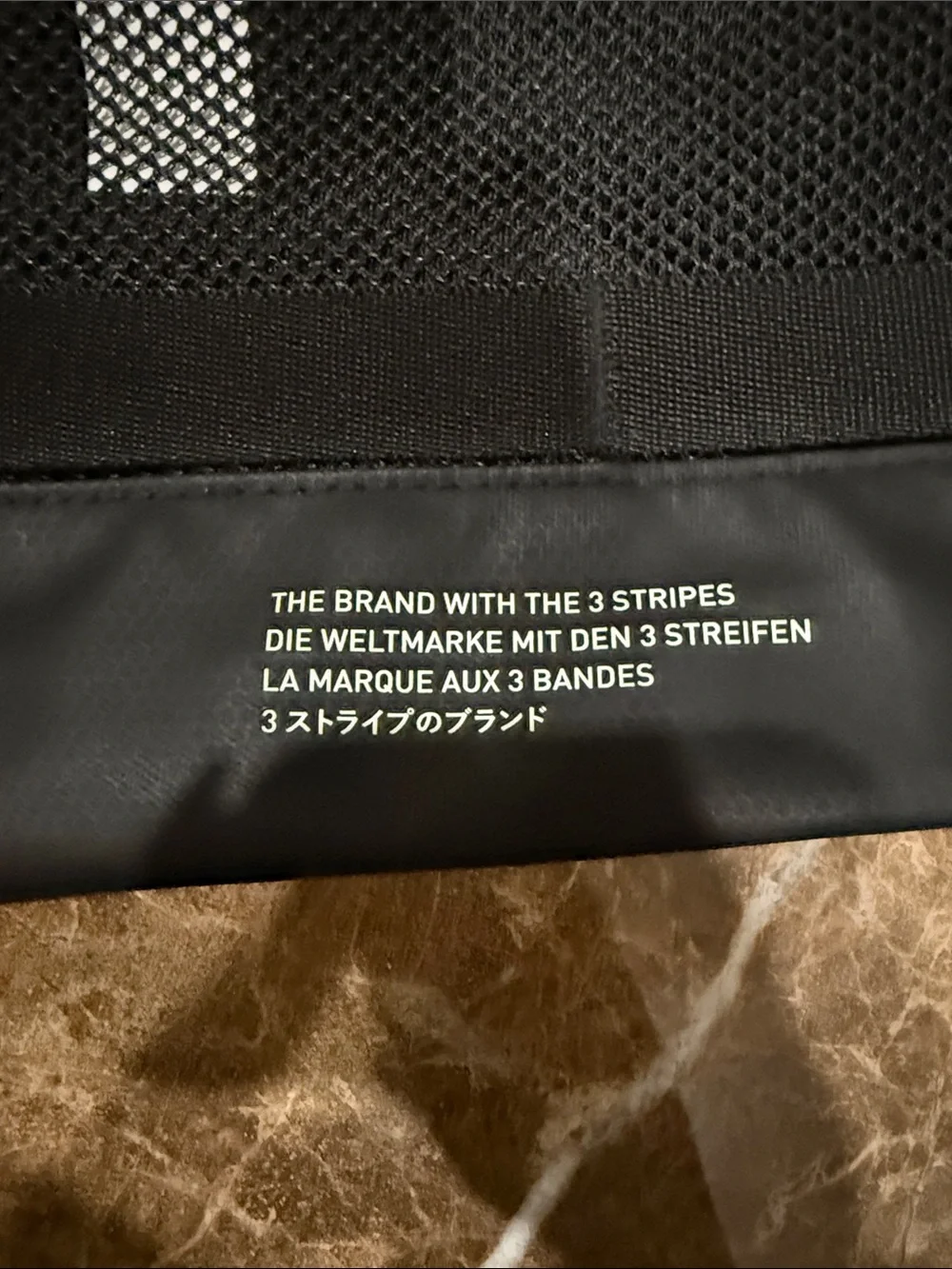 adidas Black Drawstring Sling Backpack with Reflective Three-Stripes